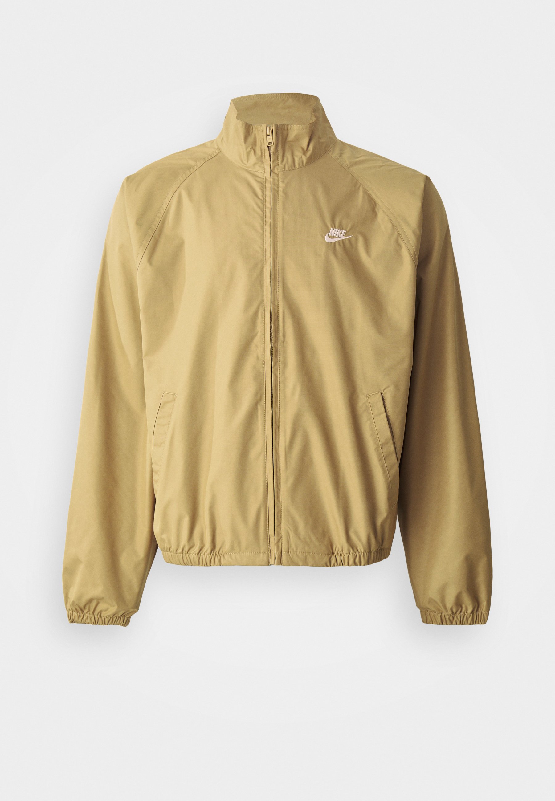 tan and white nike windbreaker