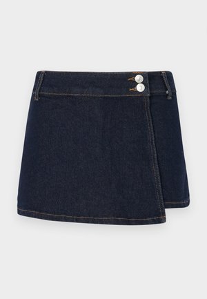 Mørk denimnederdel med draperet design, to sølvknapper i taljen og kontrastsyninger langs kanten og sømmene.