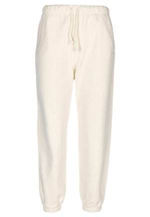 Pantalones jogger color crema con cintura elástica, cordón ajustable, bolsillos laterales y puños elásticos en los tobillos.