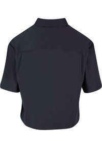 Camicetta corta a maniche corte in tessuto blu navy scuro. Caratterizzata da un colletto classico e un design pulito e minimalista senza motivi visibili.