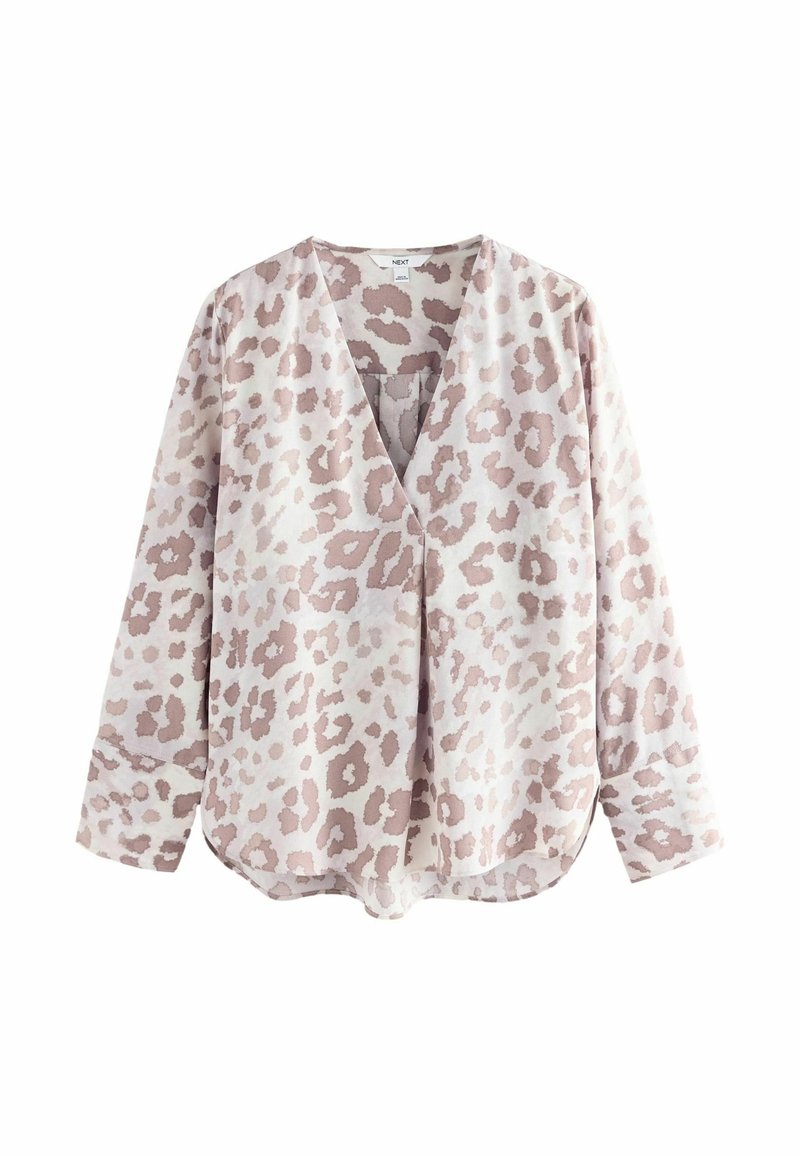 Blouse à manches longues avec motif léopard rose et beige doux, col en V et coupe ample.