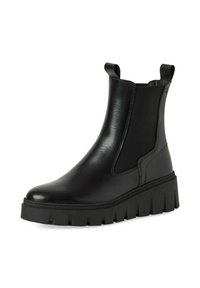 Bottines noires en cuir lisse avec des panneaux latéraux élastiques, une semelle plateforme épaisse et des tirettes pour un enfilage facile.
