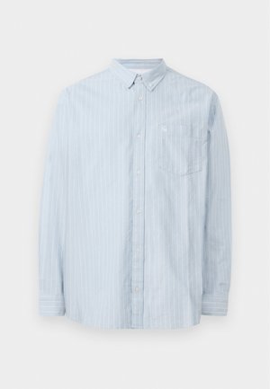 Light blue button-up shirt with white vertical stripes, featuring a collar, long sleeves, and a chest pocket. Made from a soft material.