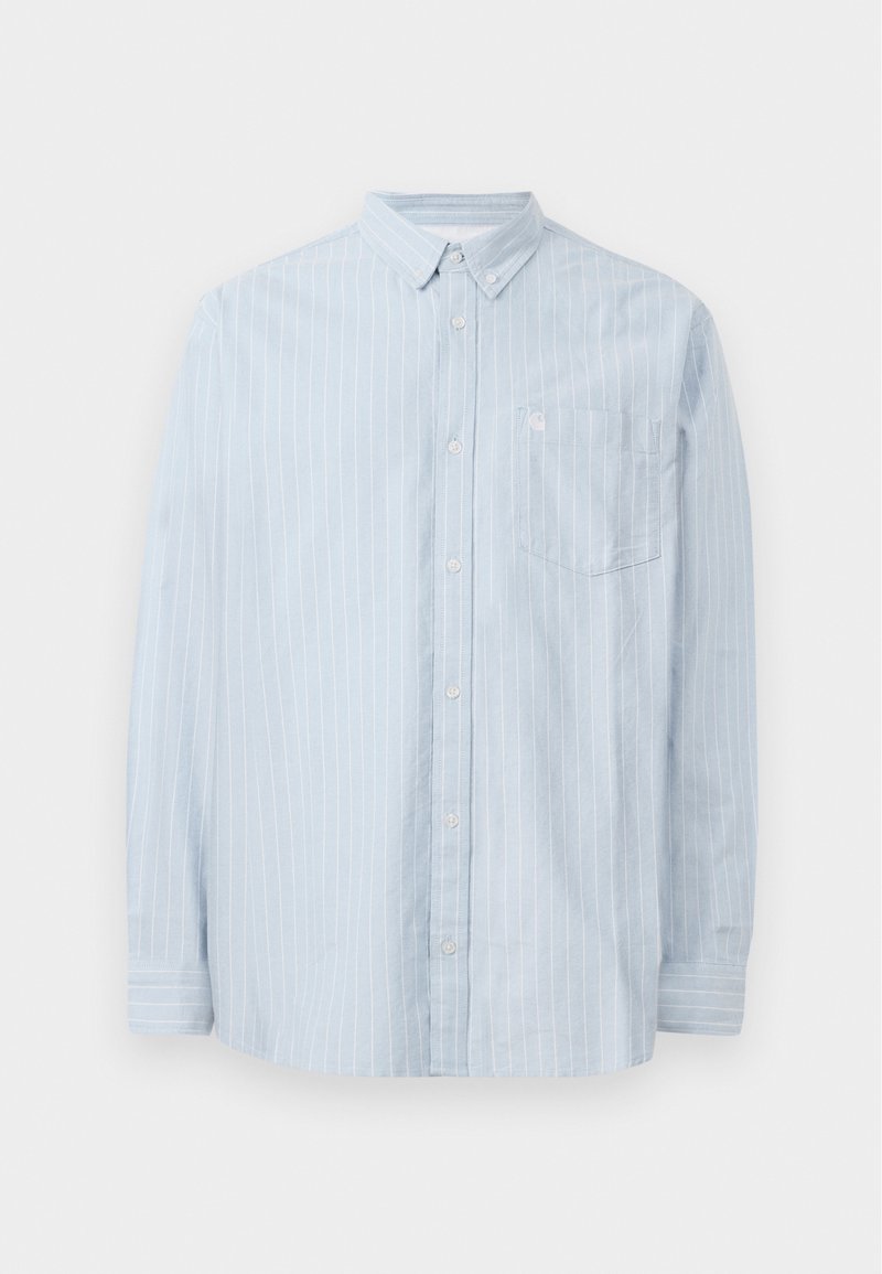 Chemise bleu clair à boutons avec des rayures blanches verticales, dotée d'un col, de manches longues et d'une poche poitrine. Fabriquée dans un matériau doux.