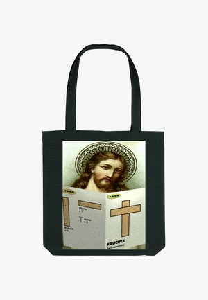 Zwarte canvas tote bag met een afbeelding van Jezus met een halo, weergegeven boven de assembly-instructies voor een kruis.