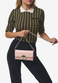 Miriade RADIOSA - Clutch - rosa