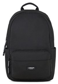 Black backpack made of durable fabric, featuring a rounded top design, front zipped pocket, and a prominent logo patch on the front.