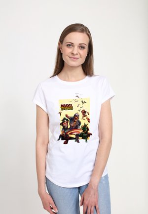 Hvid bomulds T-shirt med en farverig grafik af zombiefigurer og teksten "MARVEL ZOMBIES" på en gul baggrund. Korte ærmer, afslappet pasform.
