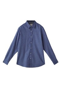 Chemise bleue à manches longues avec boutons, motif en quadrillage blanc et col pointu, étalée à plat sur un fond blanc.