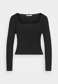 Haut noir à manches longues avec un col carré, design ajusté et texture lisse. L'étiquette indique "N-A-K-D."