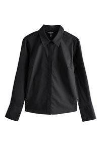 Chemise noire à manches longues avec boutons, larges poignets et col pointu, présentée à plat sur un fond blanc.