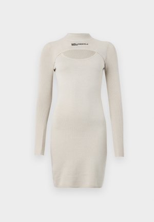 Beige ribbed knit long-sleeve bodycon dress with a high neckline, cut-out chest detail, and "KARL LAGERFELD JEANS" logo on front collar.