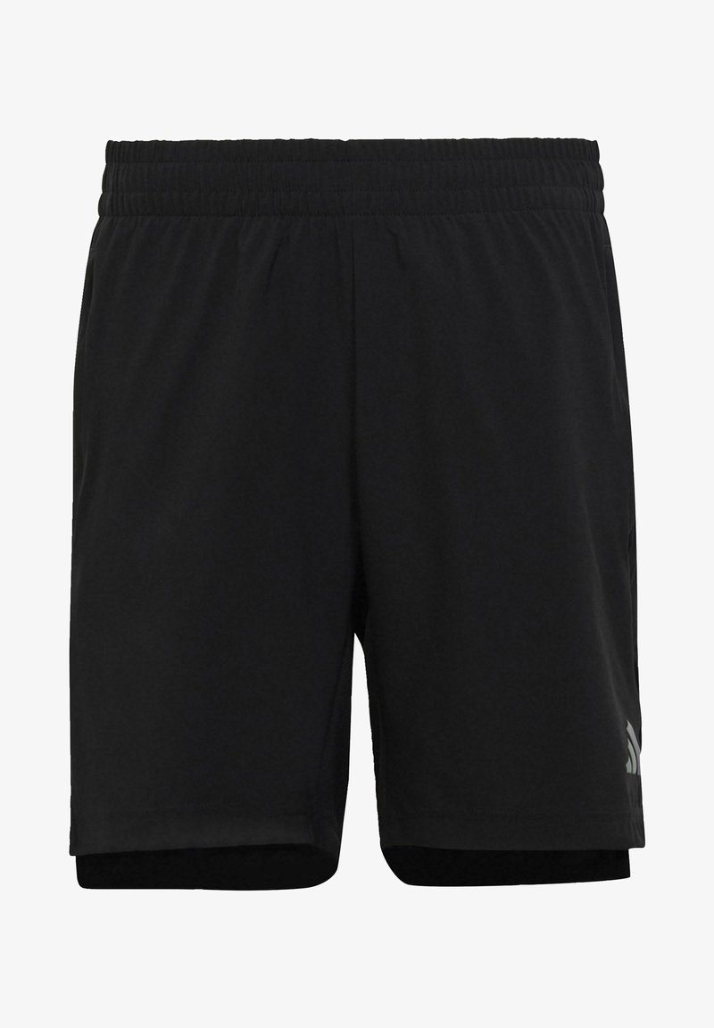 Shorts de sport noirs avec une ceinture élastique et un logo discret sur la partie inférieure de la jambe droite, conçus pour le sport ou une tenue décontractée.