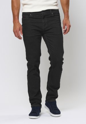 Jean noir slim fit en denim, avec un design classique à cinq poches, des coutures discrètes et une légère élasticité pour le confort.