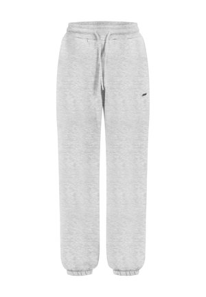 Pantaloni tuta grigio chiaro con polsini e vita elasticizzati, coulisse regolabile e piccolo logo nero sulla parte superiore della gamba sinistra.