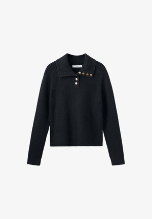 Črna rebrasta pletena jopica z dolgimi rokavi, širokim ovratnikom in vrsto šestih zlatih gumbov na ovratniku ter zgornjem delu spredaj.