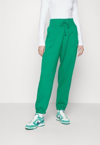 Nike Sportswear W PHNX FLC HR OS - Calças de fato de treino - malachite