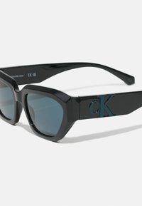 Calvin Klein Jeans UNISEX - Ochelari de soare - black