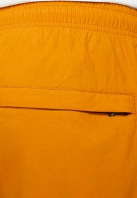 SOLO TUTA - Trainingsbroek - multicolor ocher