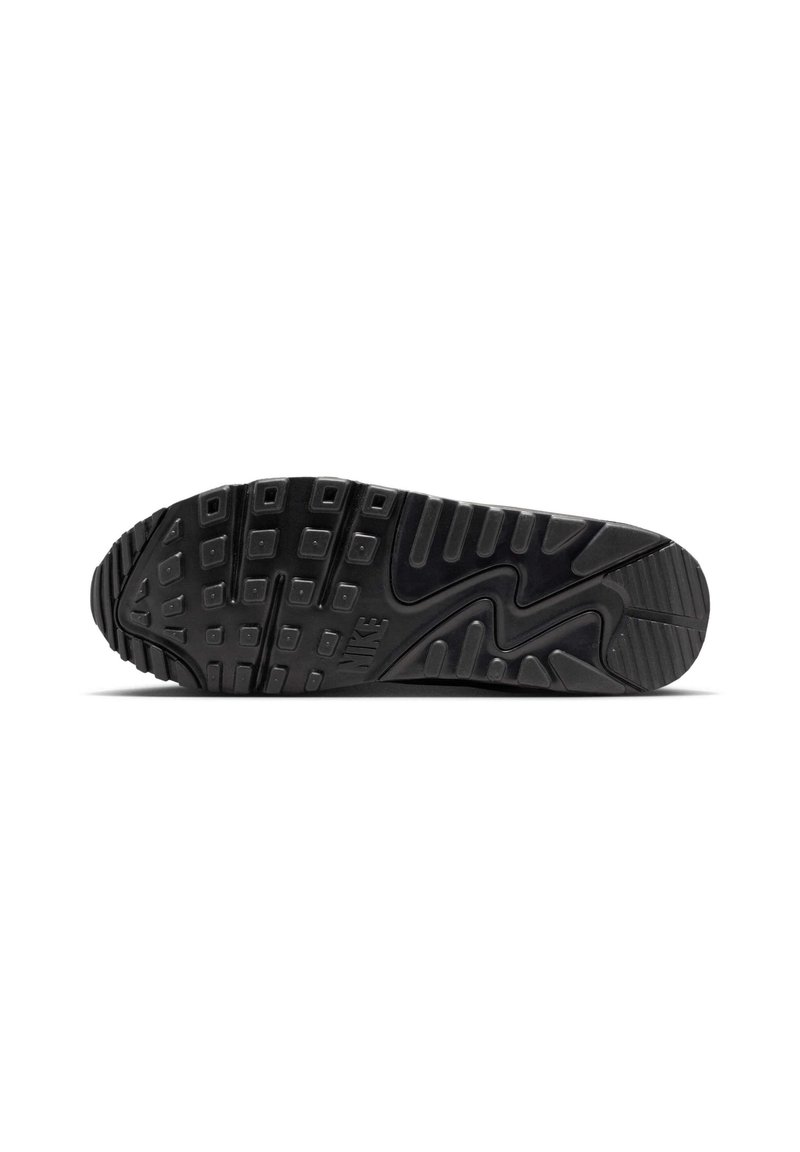 Semelle de chaussure Nike noire avec motif de bande de roulement texturé et logo, conçue pour la traction et la durabilité.