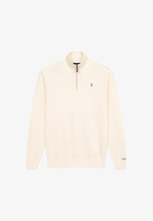 Pull-over couleur crème avec un col montant, fermeture éclair mi-hauteur et bords côtelés. Présente un petit logo sur la poitrine et un tissu texturé.