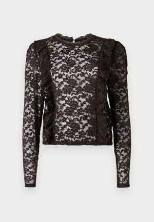 Braunspitzenoberteil mit langen Ärmeln und floralem Muster, das mit Rüschelementen an den Seiten und einem runden Ausschnitt mit Knopfverschluss hinten ausgestattet ist.