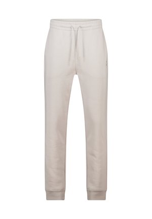 Lichtbeige joggingbroek gemaakt van zacht materiaal, voorzien van een elastische tailleband met verstelbare trekkoorden en geribbelde manchetten.