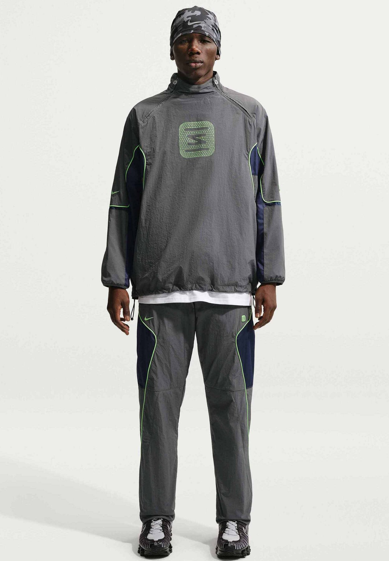 Nike SPORTSWEAR MEN'S WOVEN TROUSERS SPORTSWEAR - Tracksuit bottoms - iron grey midnight navy light lemon twist