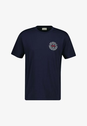 Navyblaues Baumwoll-T-Shirt mit Rundhalsausschnitt und kurzen Ärmeln. Verfügt über einen kreisförmigen Logodruck auf der linken Brust mit Textdetails.