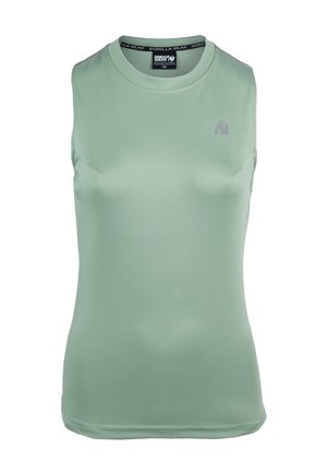 Svetly žalias be rankovių sportinis viršus su apvaliu iškirpimu, pagamintas iš lygaus audinio, turintis mažą logotipą ant krūtinės ir subtilius siuvinėjimo akcentus.