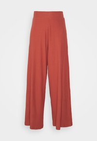 Terracotta wijde broek met een geribde tailleband, textuurstof en zonder zichtbare sluitingen of zakken. Gemakkelijke, ontspannen pasvorm.
