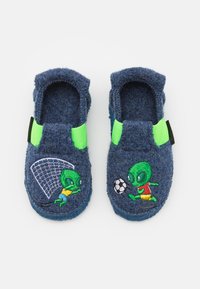 Blue felt slippers with green elastic accents, featuring embroidered alien characters playing soccer beside a goal. Lightweight and soft texture.