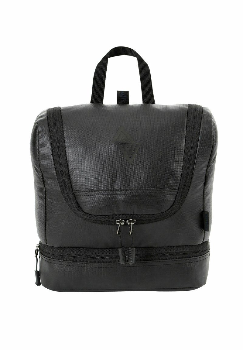 Sac à dos noir en matériau texturé, doté d'une poche frontale, de doubles zips et d'une poignée supérieure pour le transport.