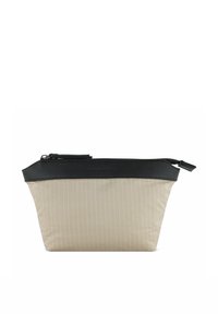 Sacca in tessuto beige con motivo a spina di pesce, rifiniture in pelle nera, chiusura superiore con zip e branding sottile sul fronte.
