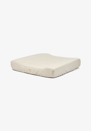 Square cushion with a soft, beige fabric cover featuring subtle, horizontal stripes. Rounded edges and a slightly contoured shape for comfort.