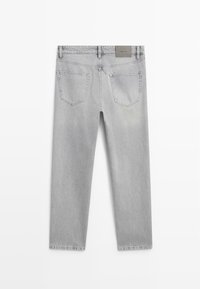 Gray denim pants with a relaxed fit, featuring two back pockets and a stitched waistband. Smooth texture and slight fading details.