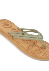 Heledad roheline kunstnahast flip-flop, millel on kolm rihma, bambusmustritega jalgpadi ja pruun kummitald. Omab väikest dekoratiivset metallaktsenti.