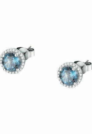Circular stud earrings featuring a blue gemstone surrounded by a halo of small clear crystals, set in a silver-toned metal base.
