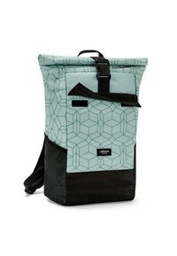 Roll-top backpack in mint green with geometric pattern, black bottom, adjustable straps, and a secure buckle closure.