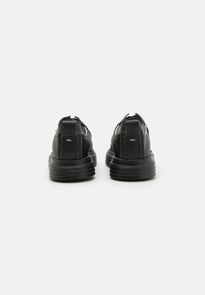 The Antipode Zapatillas - black