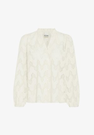 White long-sleeve blouse with lace zigzag pattern, button front, elastic cuffs, and ruffled collar by brand ICHI.