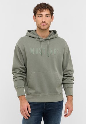 Green hoodie with a front pocket, drawstring hood, and textured fabric. Features embossed "MUSTANG" logo in a lighter shade of green.