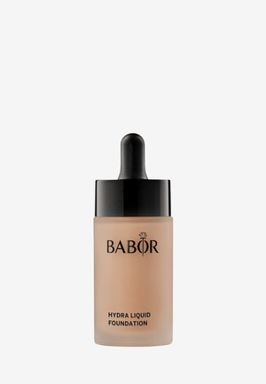 Babor Hydra Liquid Foundation in een matglazen fles met een zwarte pipetdop, met een zwart logo en tekst aan de onderkant.