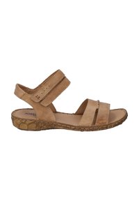 Sandal in pelle beige con tre cinturini regolabili, suola in gomma marrone testurizzata e tacco leggermente rialzato per comfort e stabilità.