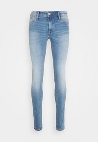 Ljusblå skinny jeans med en lätt blekning, tillverkade av denim. Har dragkedja i gylfen och klassisk 5-fickdesign. Ren fåll och minimal hårdvara.
