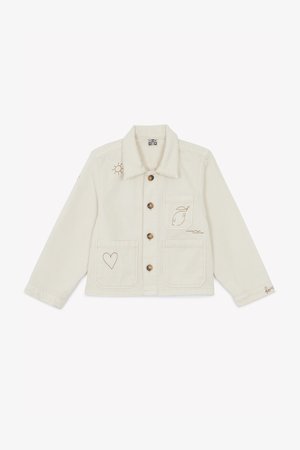Cream-colored denim jacket featuring brown embroidered designs: sun, whale, waves, and heart. Button closure and two front pockets.