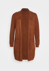 Cardigan lungo color ruggine realizzato in tessuto a maglia testurizzato, con apertura davanti e due tasche laterali. Senza bottoni; maniche lunghe.