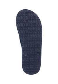 Sole di sandalo in gomma nera con un motivo di battistrada testurizzato e due impressioni circolari del logo. Forma leggermente contornata per il supporto del piede.