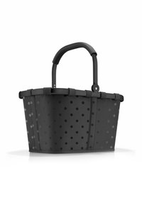 Schwarzer Korb mit Polka-Dots aus strapazierfähigem Stoff, ausgestattet mit einem gebogenen schwarzen Griff und stabilen Seiten. Der Korb hat eine weite Öffnung und einen verstärkten Boden.