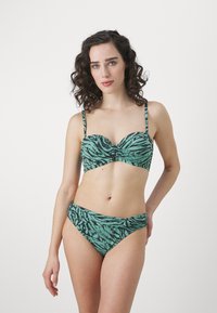 Groene en zwarte geblokte bikini set met een geknoopte bandeau top en mid-rise broekjes, gemaakt van een gladde stof met verstelbare bandjes.
